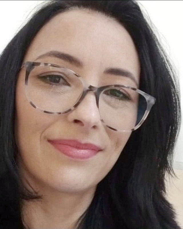 Professor(a) Corine